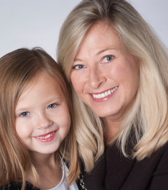 Mother and her daughter smiling after Rule Dentistry visit