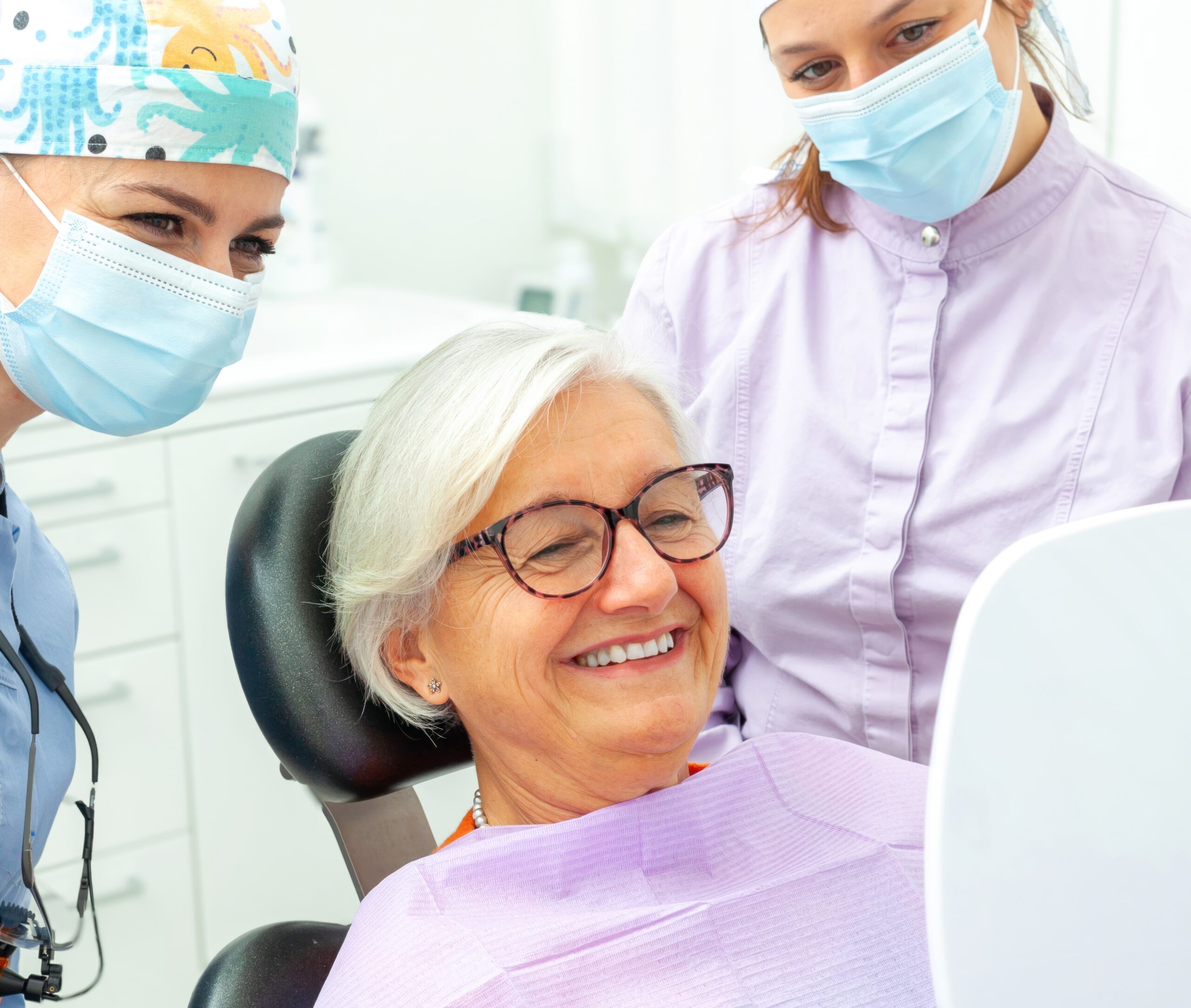 An older woman smiling happily
